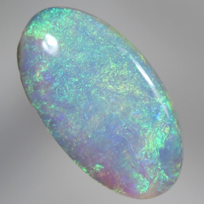SOLID CRYSTAL OPAL Bright green fire plays in a 3D pattern throughout the opal